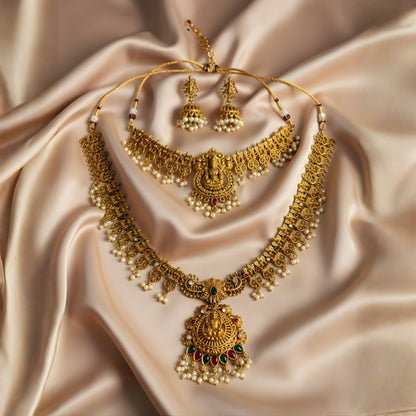 Antique gold Lakshmi temple jewellery set with pearl drops and matching jhumkas