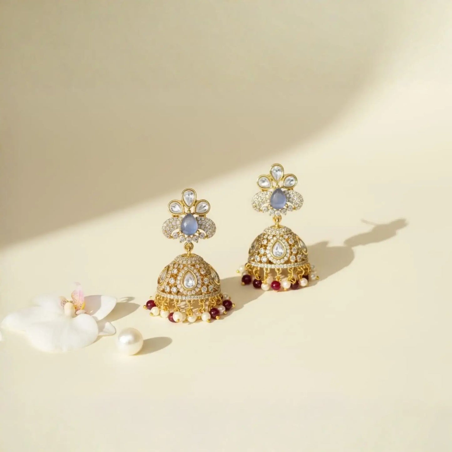 Gold Earrings with Green Stones and Kundan Detailing