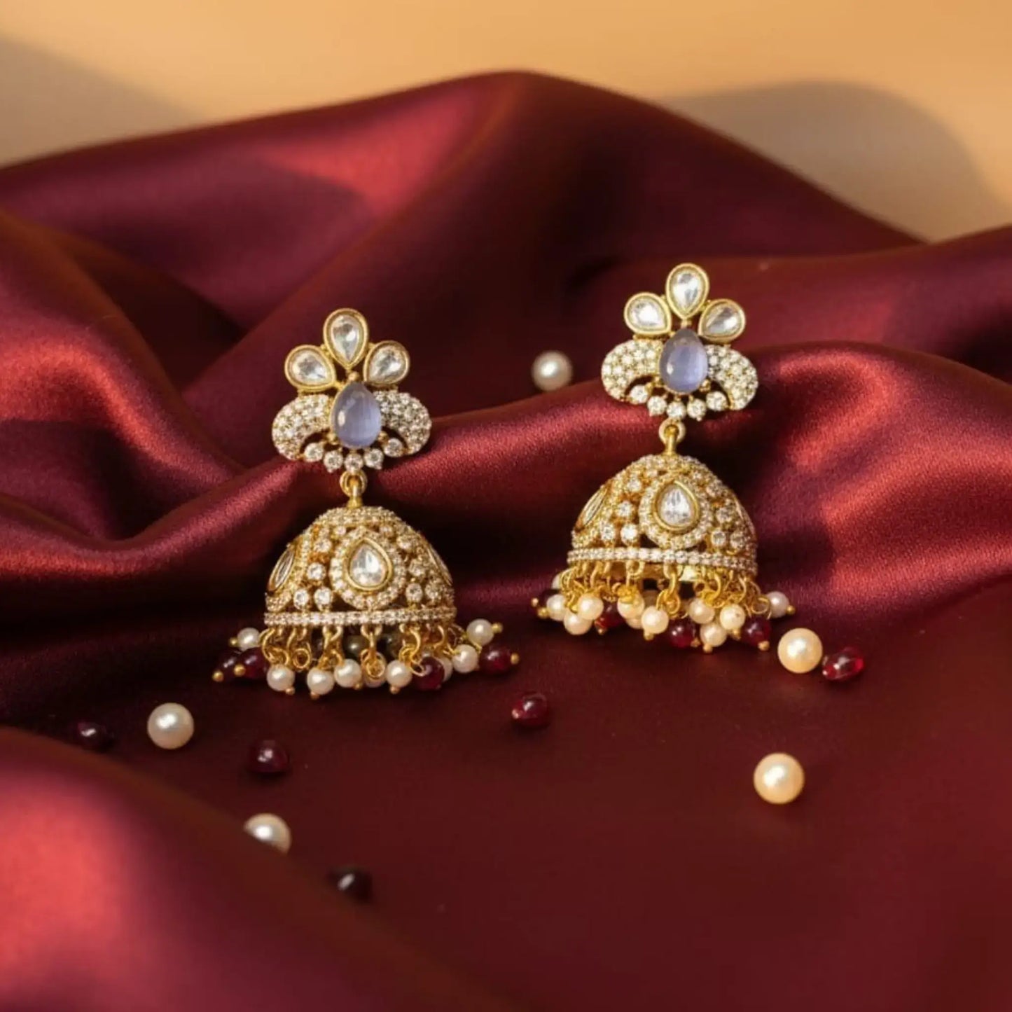 Gold Earrings with Green Stones and Kundan Detailing