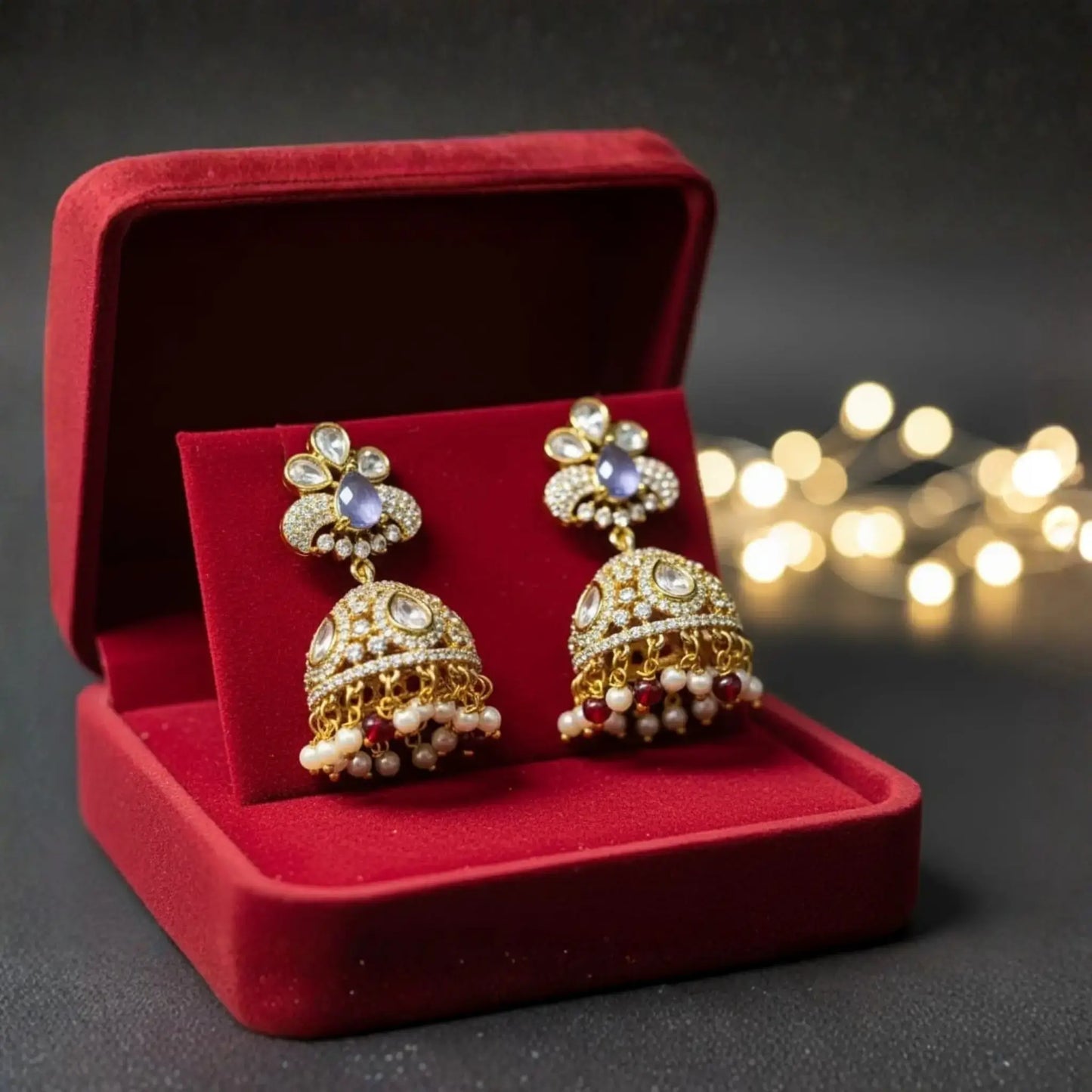 Gold Earrings with Green Stones and Kundan Detailing