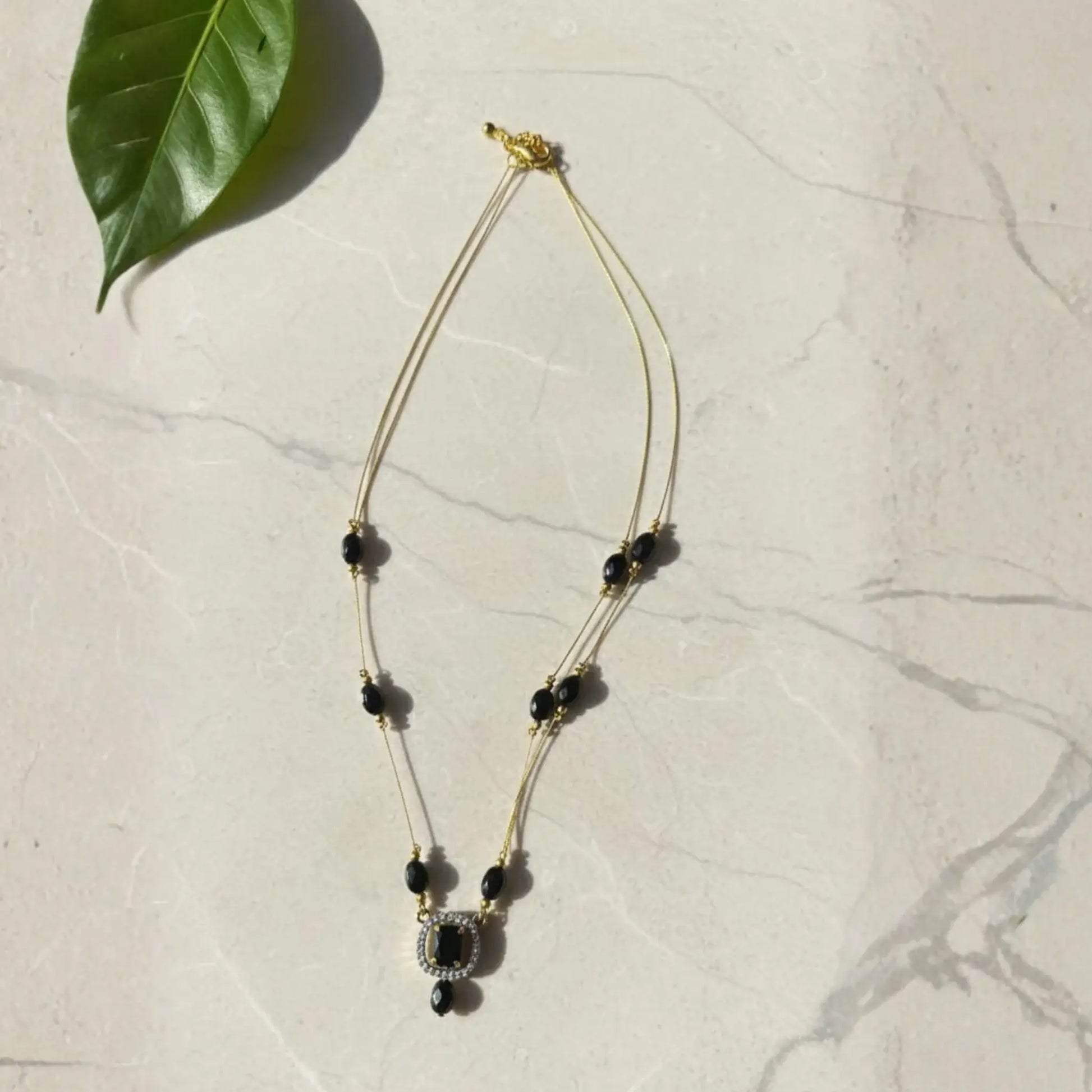 Violet Stone Necklace With Gold-Plated Dual Pendant Design